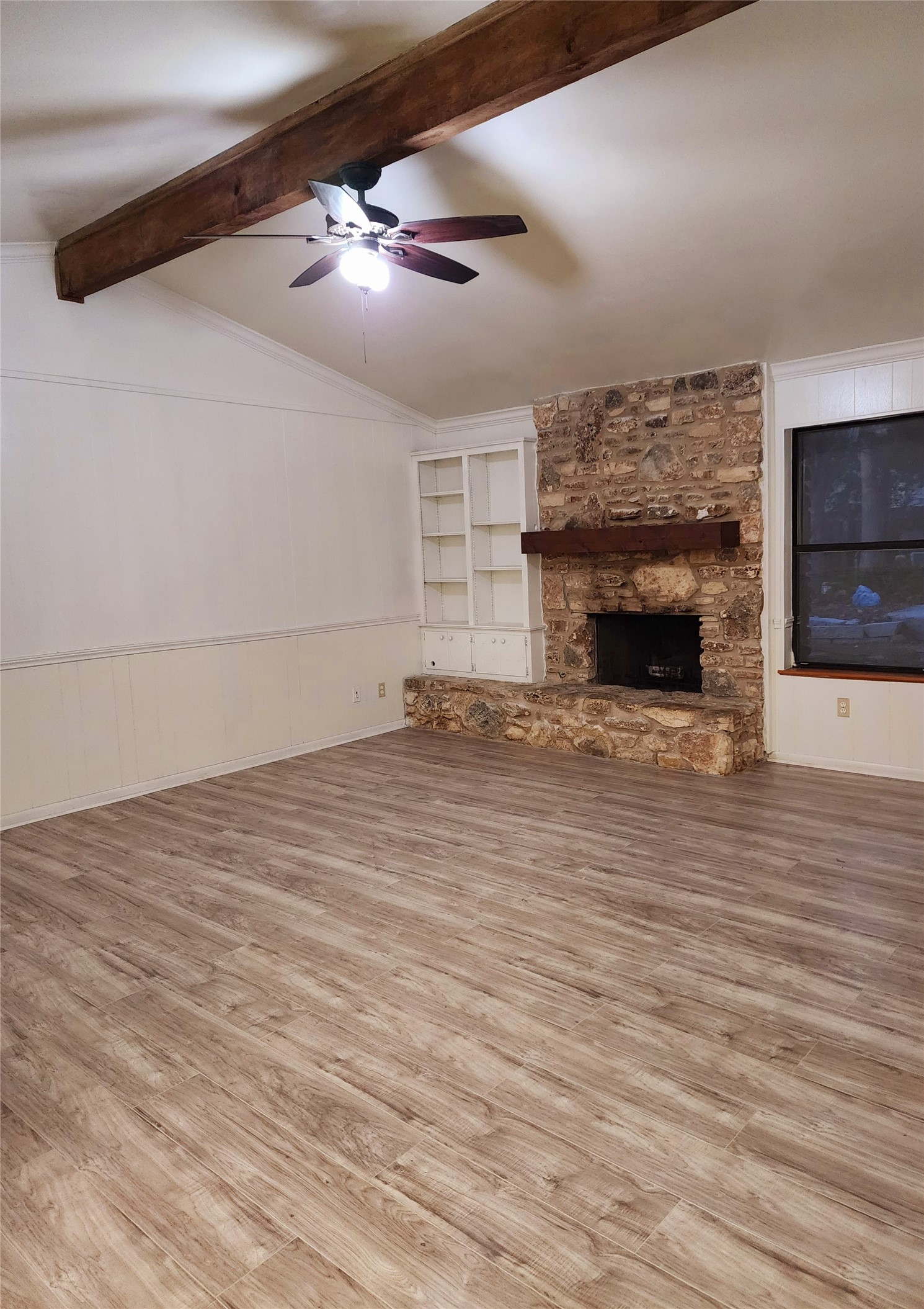 2000 Donna Drive Taylor, TX 76574 - Photo 11 of 27 a view of empty room with wooden floor and fireplace