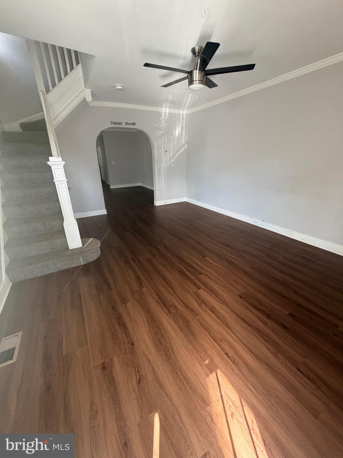 412 East Cold Spring Lane Baltimore, MD 21212 - Photo 6 of 8 a view of entryway and hall with wooden floor