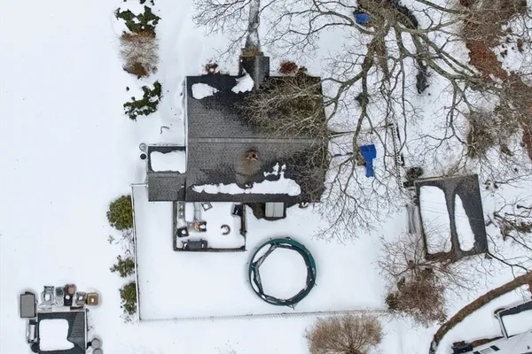 a bathroom with a sink toilet and mirror