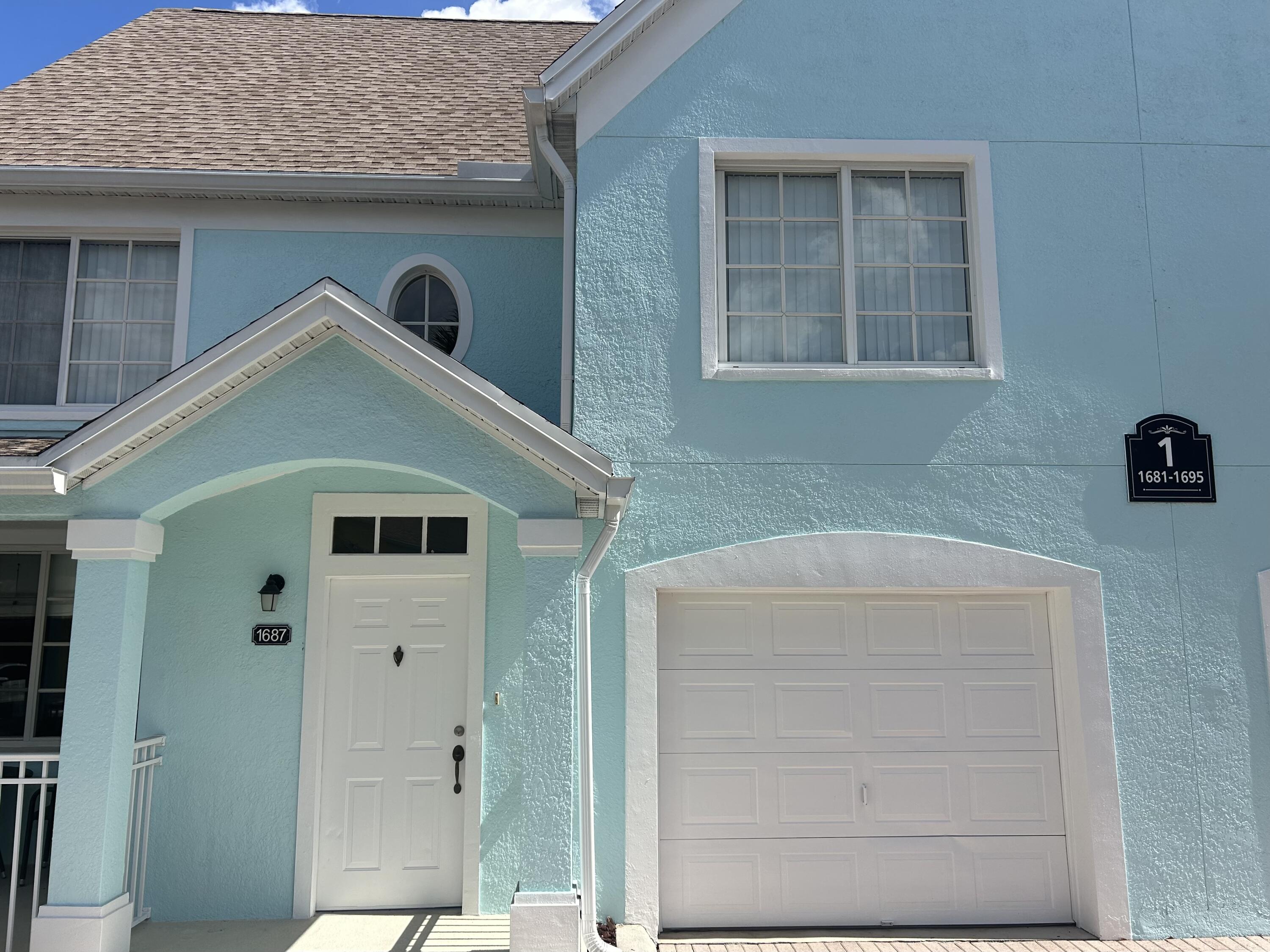 1687 Southeast Pomeroy Street Stuart, FL 34997 - Photo 2 of 20 a view of backyard of the house