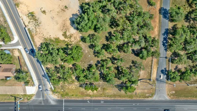 a view of balcony with wooden floor