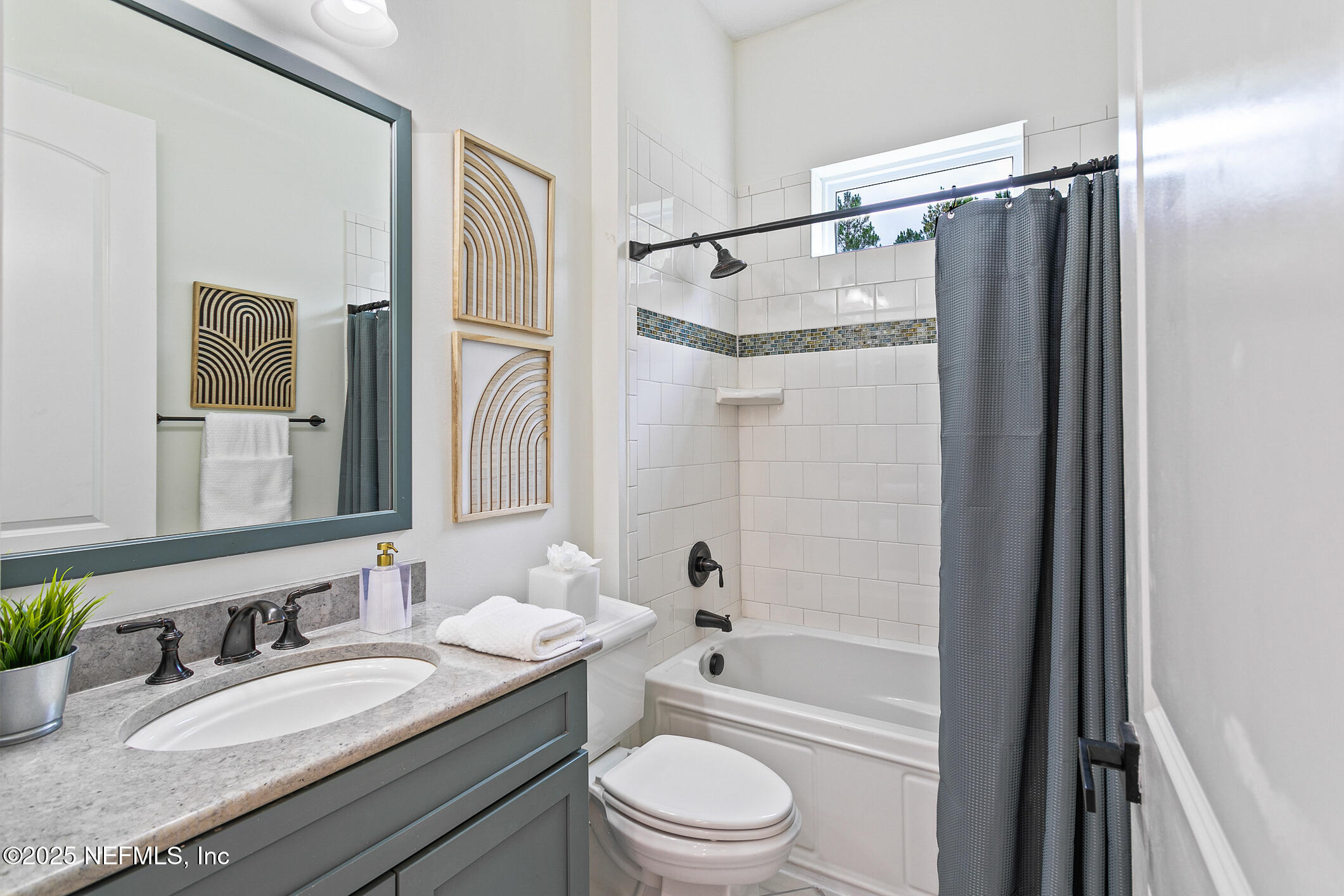 124 Mollusk Road St. Johns, FL 32259 - Photo 35 of 94 a bathroom with a granite countertop sink toilet and shower