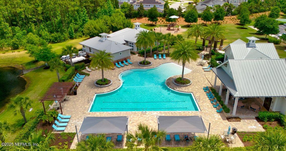 124 Mollusk Road St. Johns, FL 32259 - Photo 83 of 94 an aerial view of a house with yard swimming pool and outdoor seating