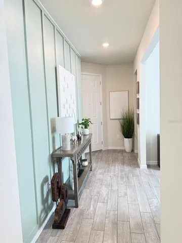 a room with a table and chairs