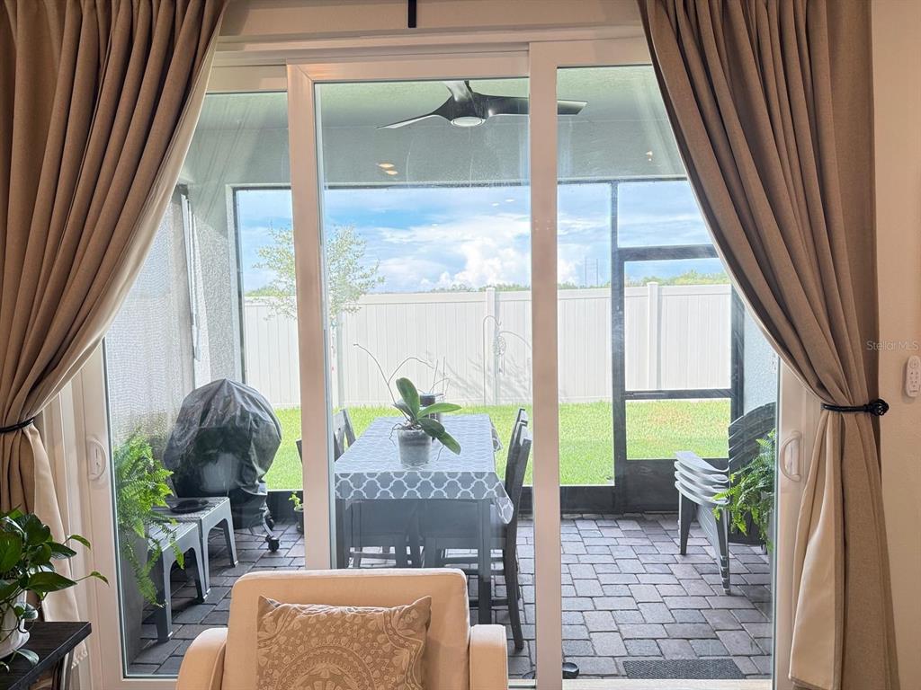 1873 Spring Shower Circle Kissimmee, FL 34744 - Photo 9 of 18 a living room filled with furniture