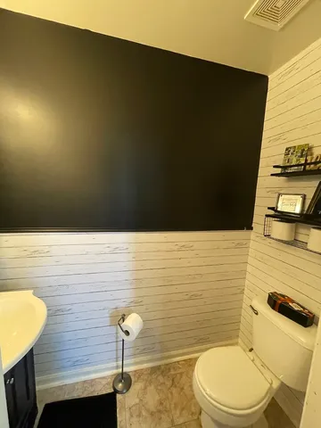 a bathroom with a toilet