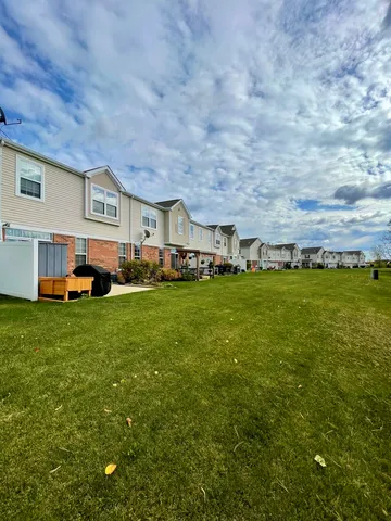 a front view of house with yard