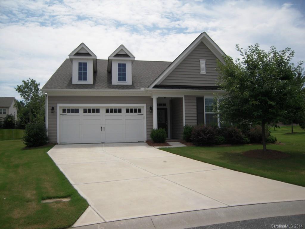 416 Nugget Court, Unit 39 Fort Mill, SC 29708 - Photo 1 of 24 a front view of a house with a yard and garage
