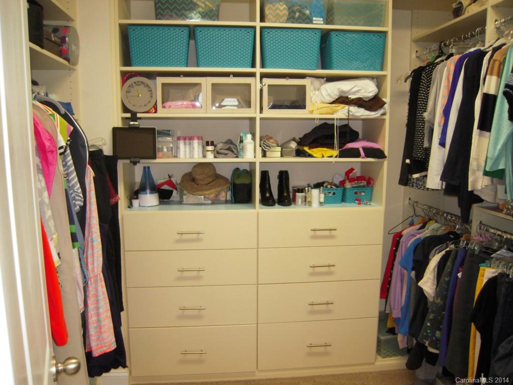 416 Nugget Court, Unit 39 Fort Mill, SC 29708 - Photo 14 of 24 a view of walk in closet with clothes and shoes