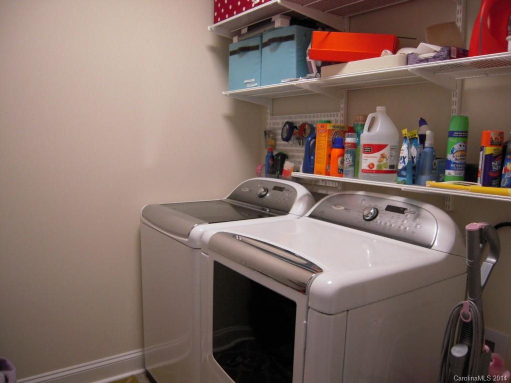 416 Nugget Court, Unit 39 Fort Mill, SC 29708 - Photo 16 of 24 a utility room with dryer and washer
