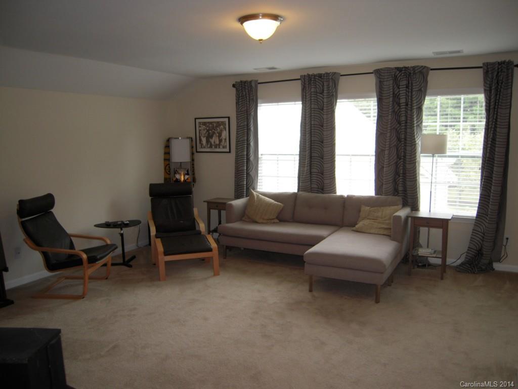 416 Nugget Court, Unit 39 Fort Mill, SC 29708 - Photo 20 of 24 a living room with furniture and a window
