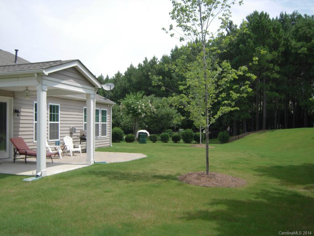 416 Nugget Court, Unit 39 Fort Mill, SC 29708 - Photo 24 of 24 a view of a house with a yard and sitting area