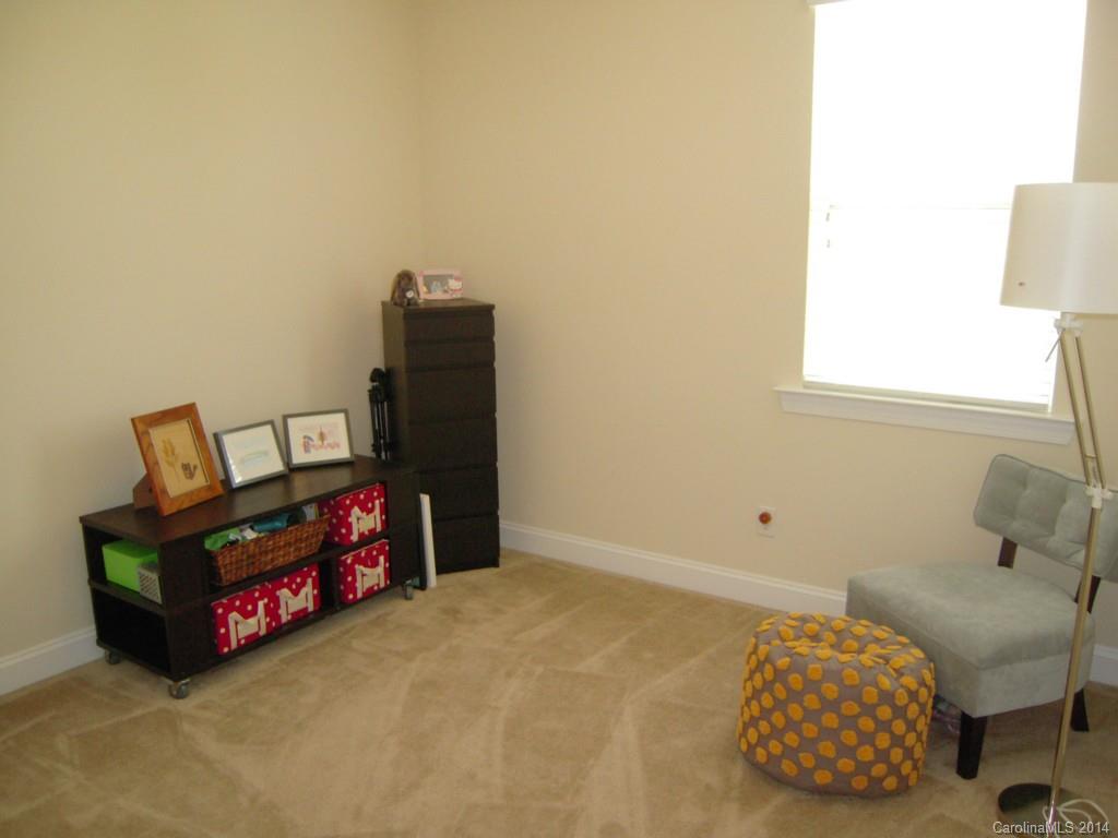 416 Nugget Court, Unit 39 Fort Mill, SC 29708 - Photo 9 of 24 a room with toys and dresser