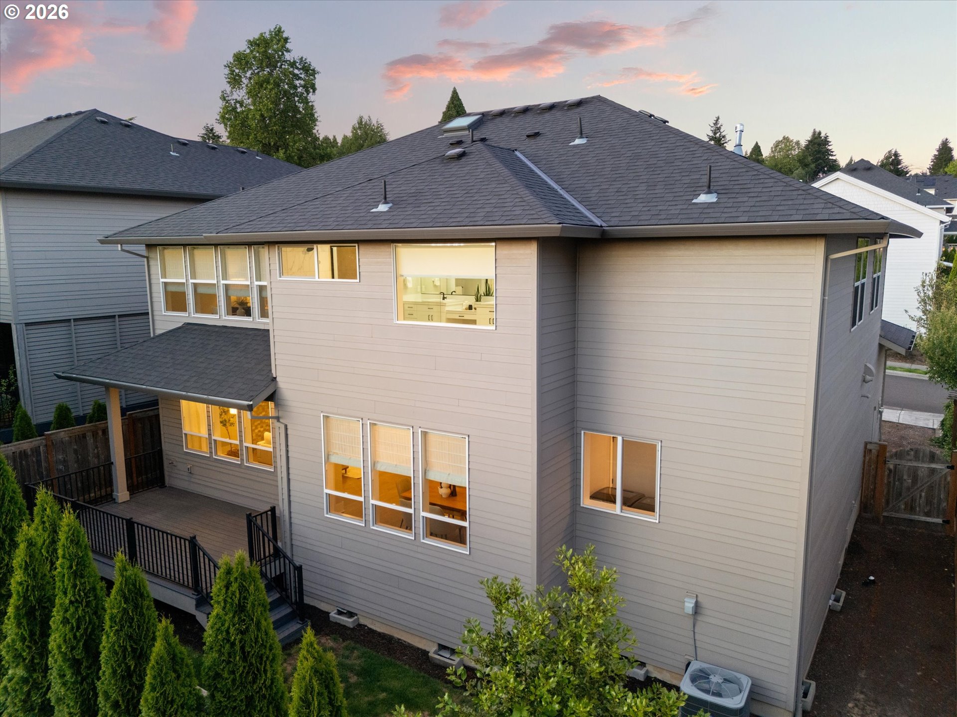 14551 Southwest 153rd Avenue Portland, OR 97224 - Photo 43 of 45 a aerial view of a house with a yard and potted plants