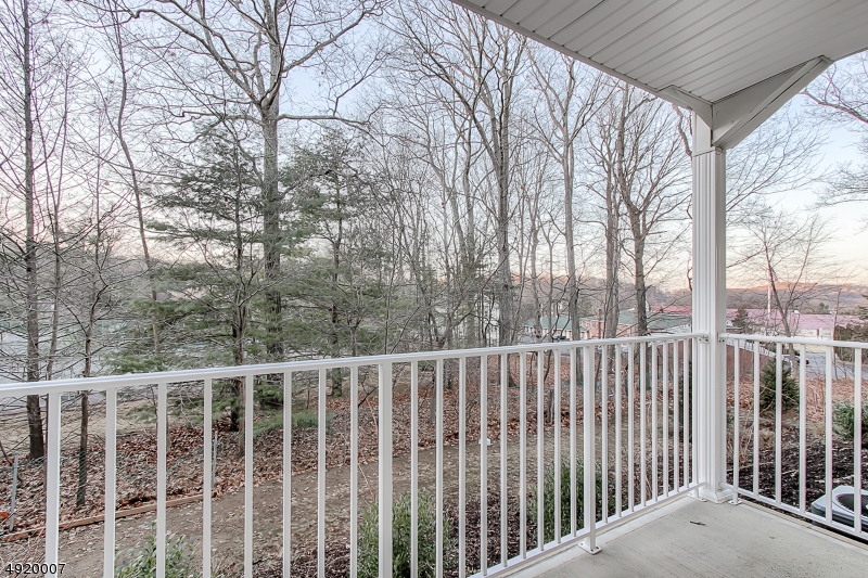 2889 Highway 10, Unit 2301 Morris Plains, NJ 07950 - Photo 8 of 16 a view of a wooden fence