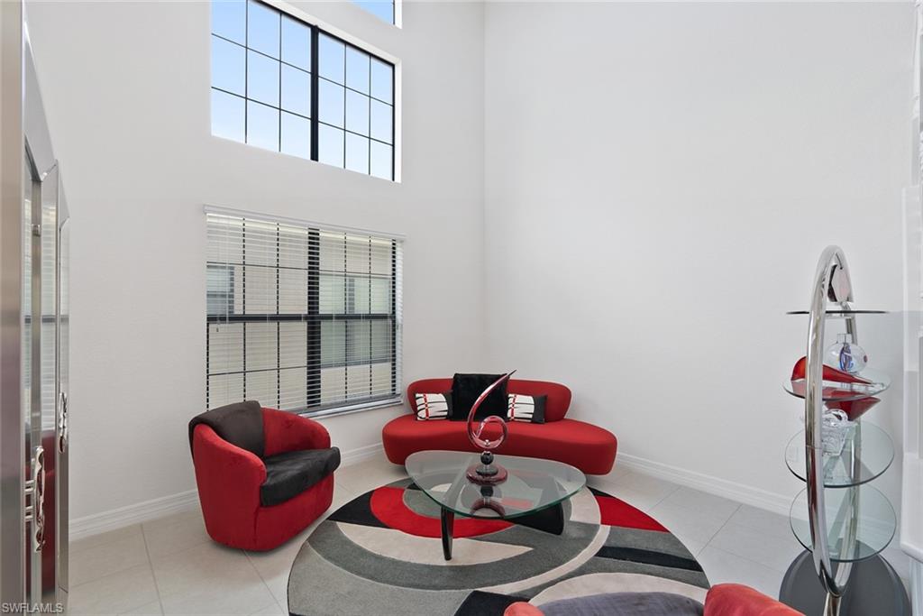 13750 Callisto Avenue Naples, FL 34109 - Photo 15 of 46 a living room with furniture