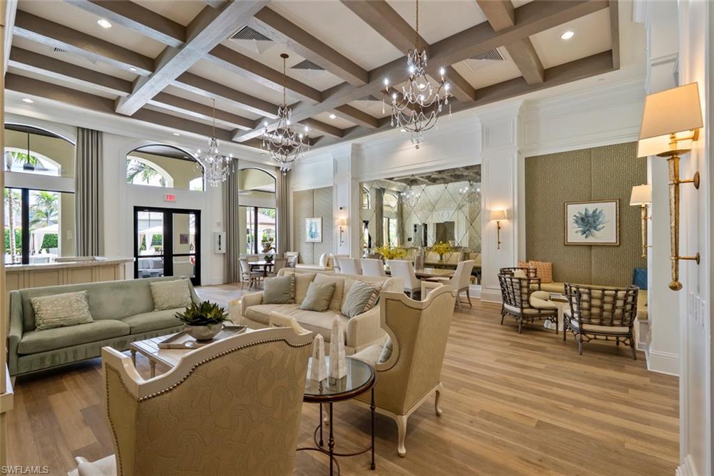 13750 Callisto Avenue Naples, FL 34109 - Photo 37 of 46 a living room with furniture and wooden floor