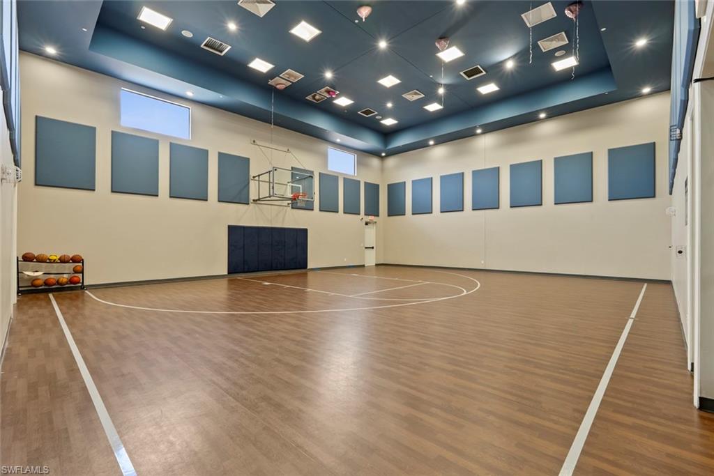 13750 Callisto Avenue Naples, FL 34109 - Photo 39 of 46 a view of an empty room with wooden floor