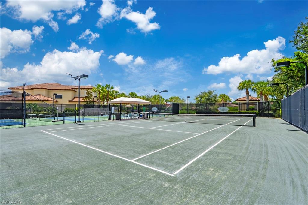 13750 Callisto Avenue Naples, FL 34109 - Photo 43 of 46 a view of a tennis court