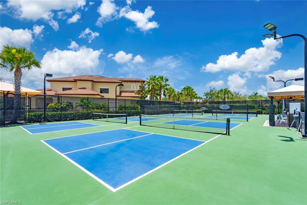 13750 Callisto Avenue Naples, FL 34109 - Photo 44 of 46 a view of a tennis court