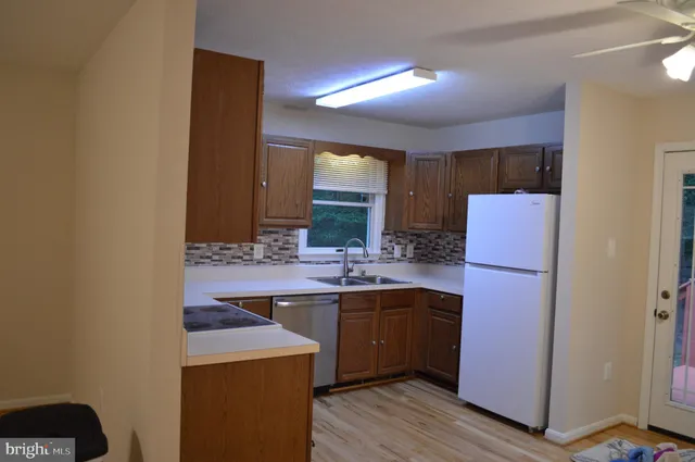 a view of balcony with wooden floor