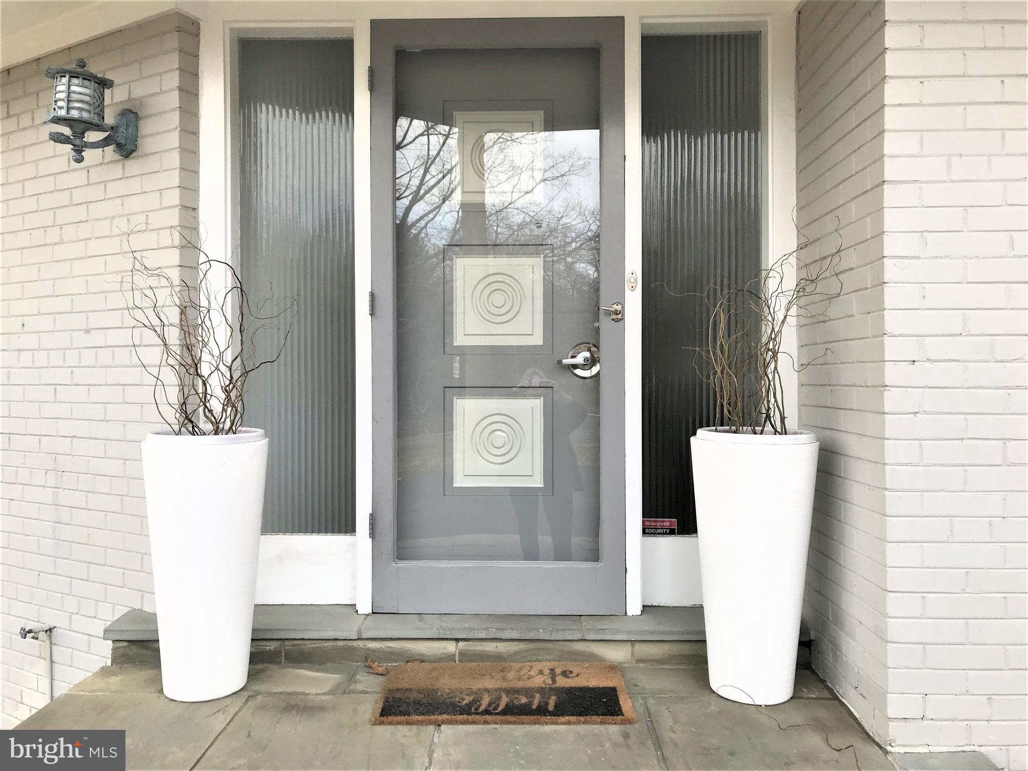 7514 Nevis Road Bethesda, MD 20817 - Photo 1 of 1 Serenity lies behind this contemporary entry.