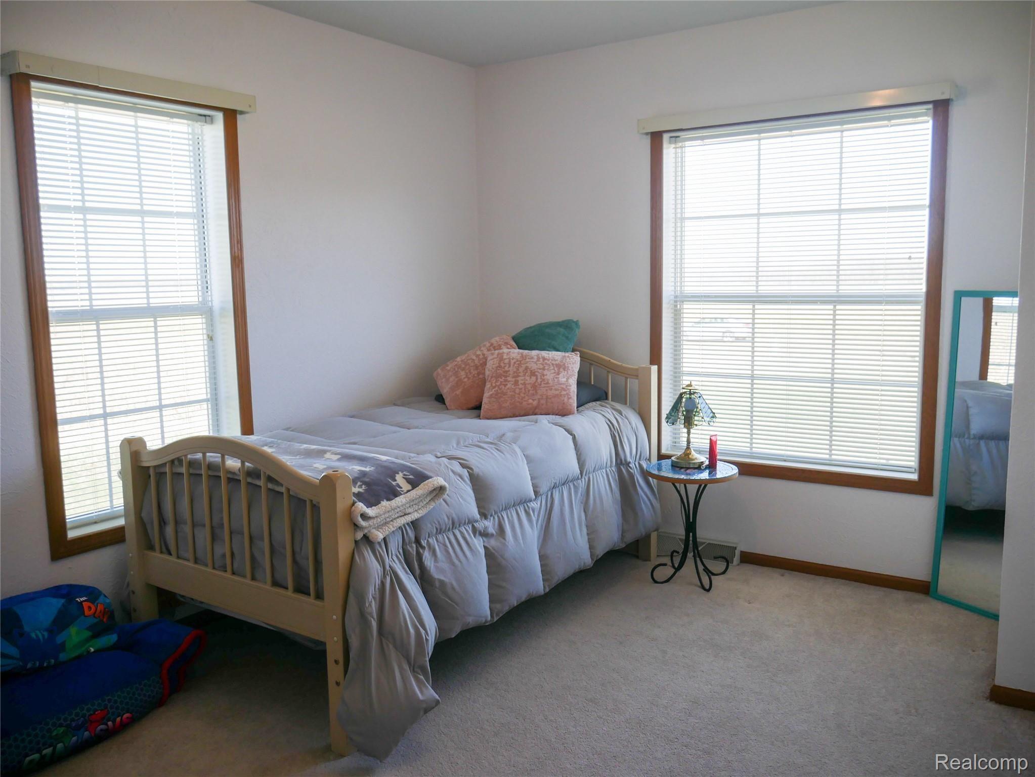 11595 West Sober Road Webberville, MI 48892 - Photo 30 of 42 11595 bedroom 3 1.jpg