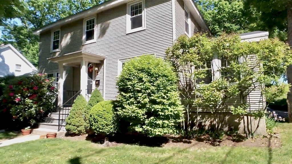 8 Dunedin Road Wellesley, MA 02481 - Photo 12 of 12 a view of a house with a yard and garden