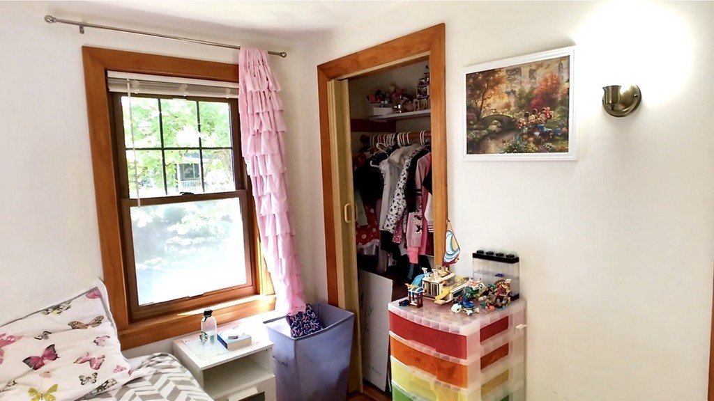 8 Dunedin Road Wellesley, MA 02481 - Photo 10 of 12 a living room with furniture and a window