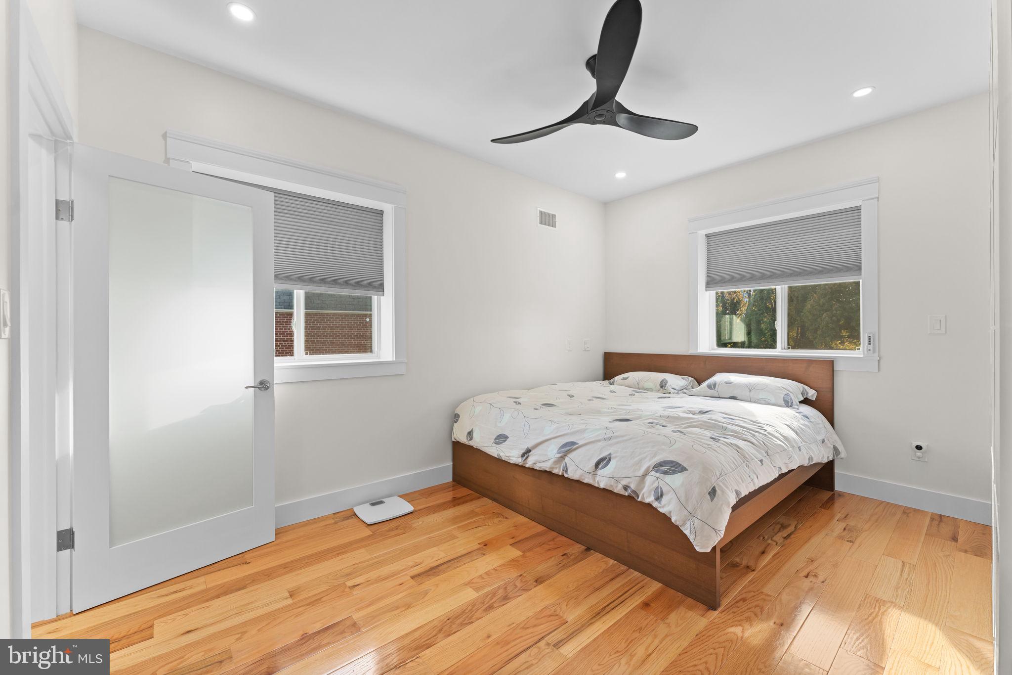 9975 Woodfern Road Philadelphia, PA 19115 - Photo 16 of 35 a bedroom with a large bed and a window