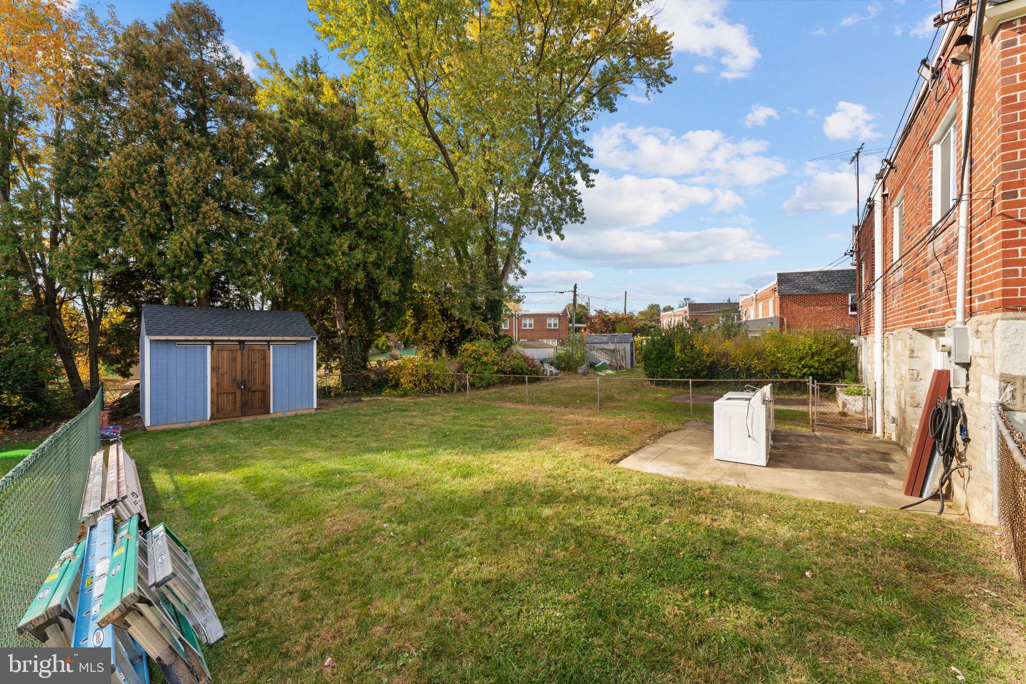 9975 Woodfern Road Philadelphia, PA 19115 - Photo 33 of 35 a backyard of a house with lots of green space