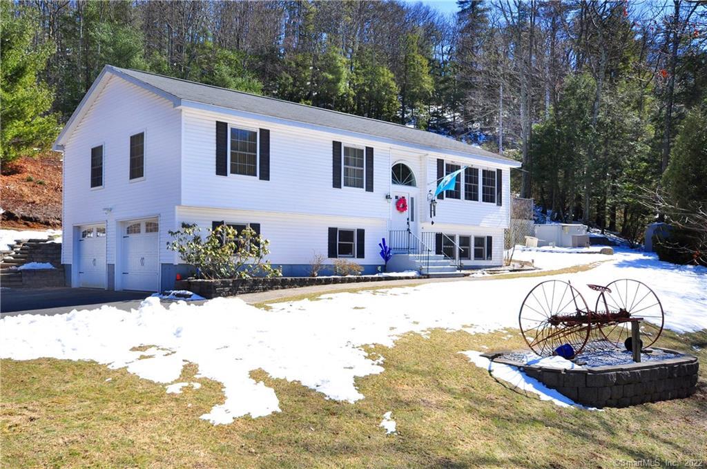 50 Notch Road Granby, CT 06035 - Photo 1 of 1 a swimming pool with outdoor seating and yard