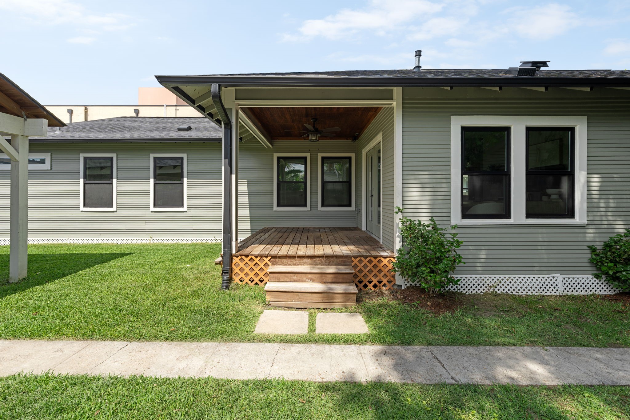 1022 Key Street Houston, TX 77009 - Photo 27 of 30 Whether it’s a rainy afternoon or a breezy summer evening, the covered patio ensures you can enjoy the fresh air year-round.