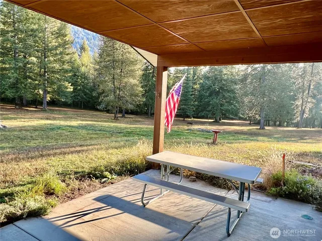 a view of a swimming pool with a patio