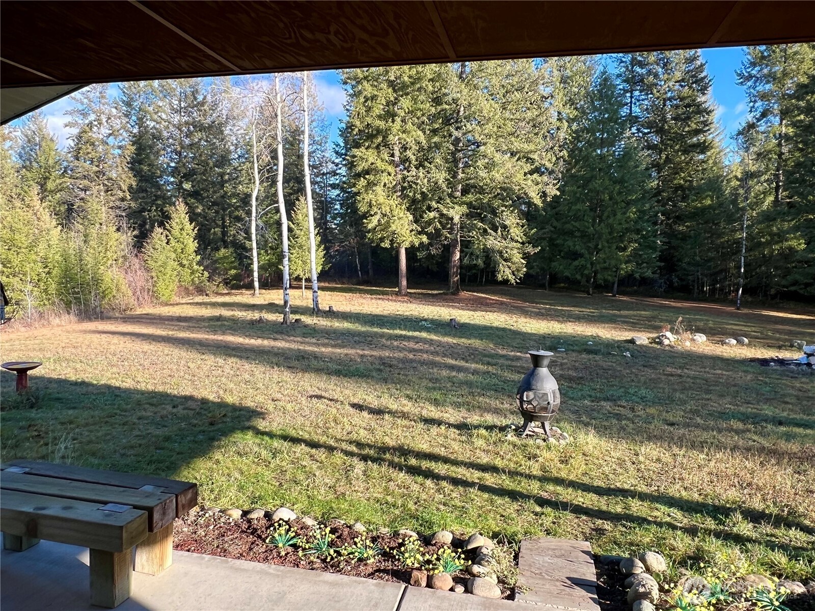 4084 Deep Lake Boundary Road Colville, WA 99114 - Photo 27 of 40 a view of a yard with an outdoor space