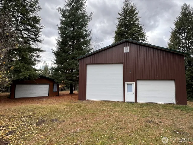 a front view of house with garage