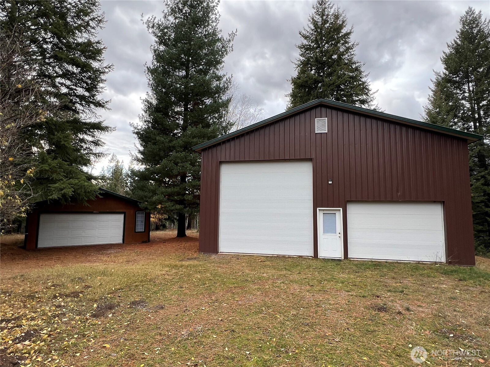 4084 Deep Lake Boundary Road Colville, WA 99114 - Photo 30 of 40 a front view of house with garage