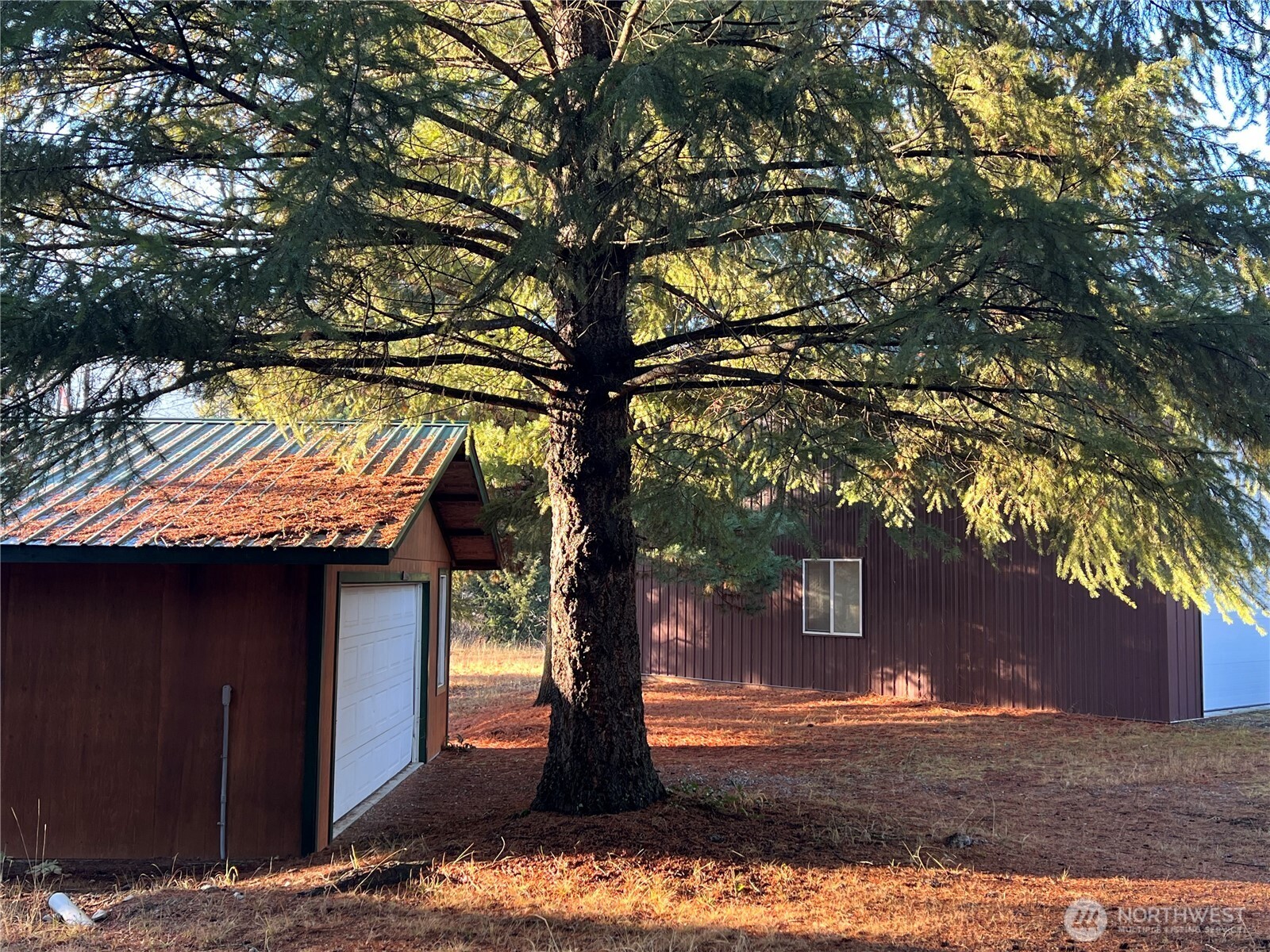 4084 Deep Lake Boundary Road Colville, WA 99114 - Photo 34 of 40 a front view of a house with a yard