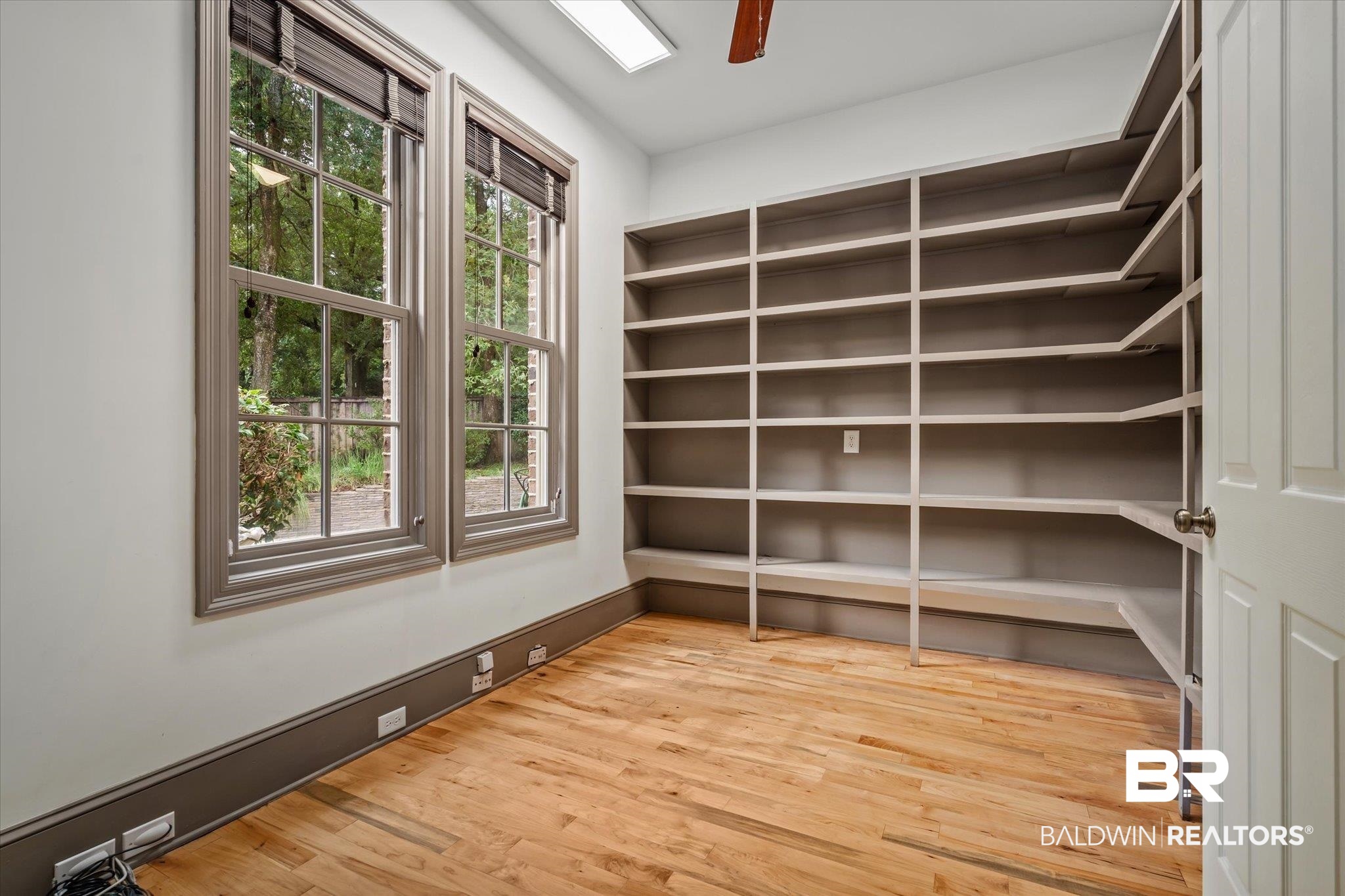 812 Country Club Court Mobile, AL 36609 - Photo 10 of 34 Interior space featuring hardwood / wood-style flooring and ceiling fan