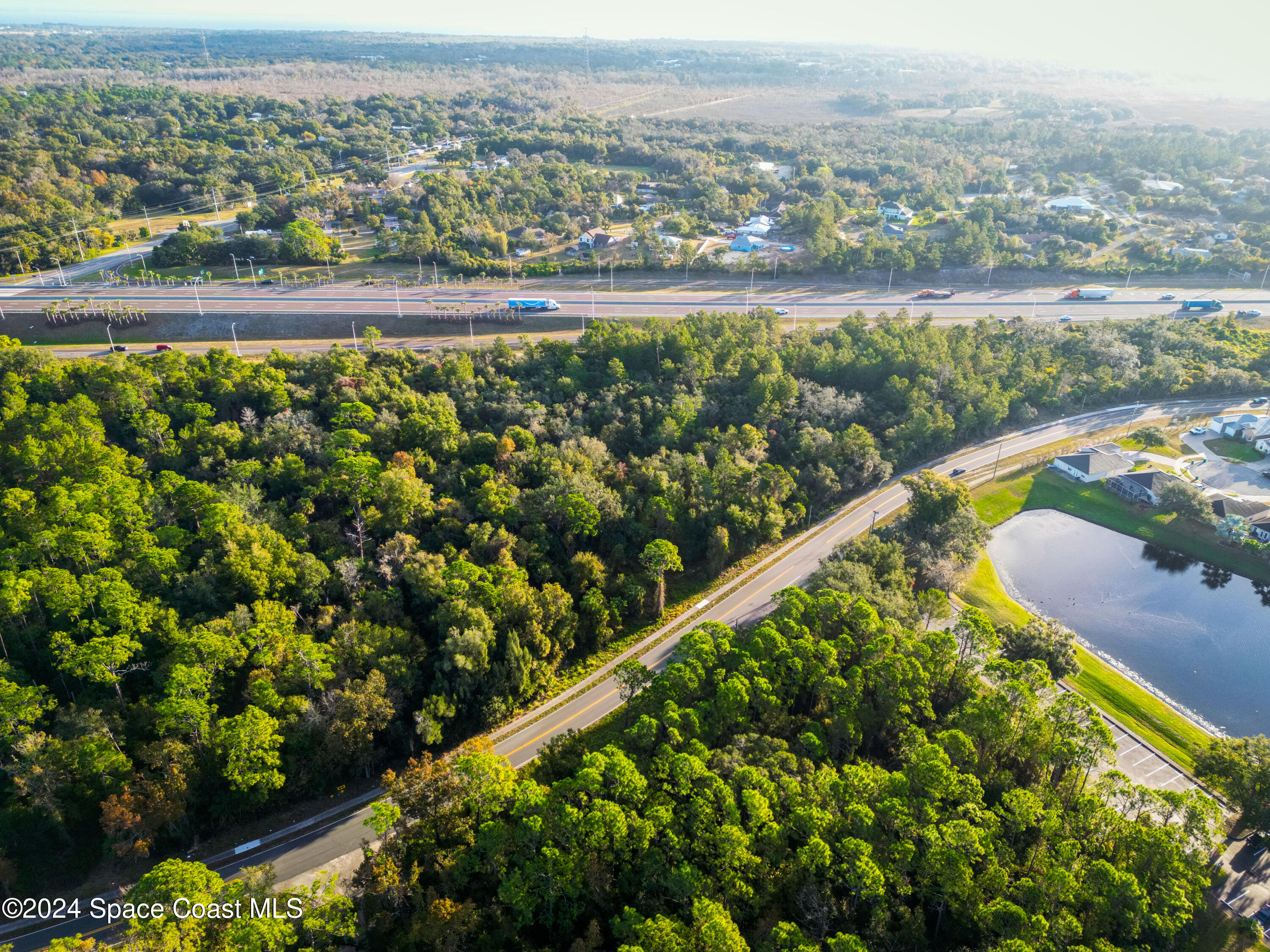 0 North Carpenter Road Titusville, FL 32796 - Photo 1 of 14 a view of a city and lake