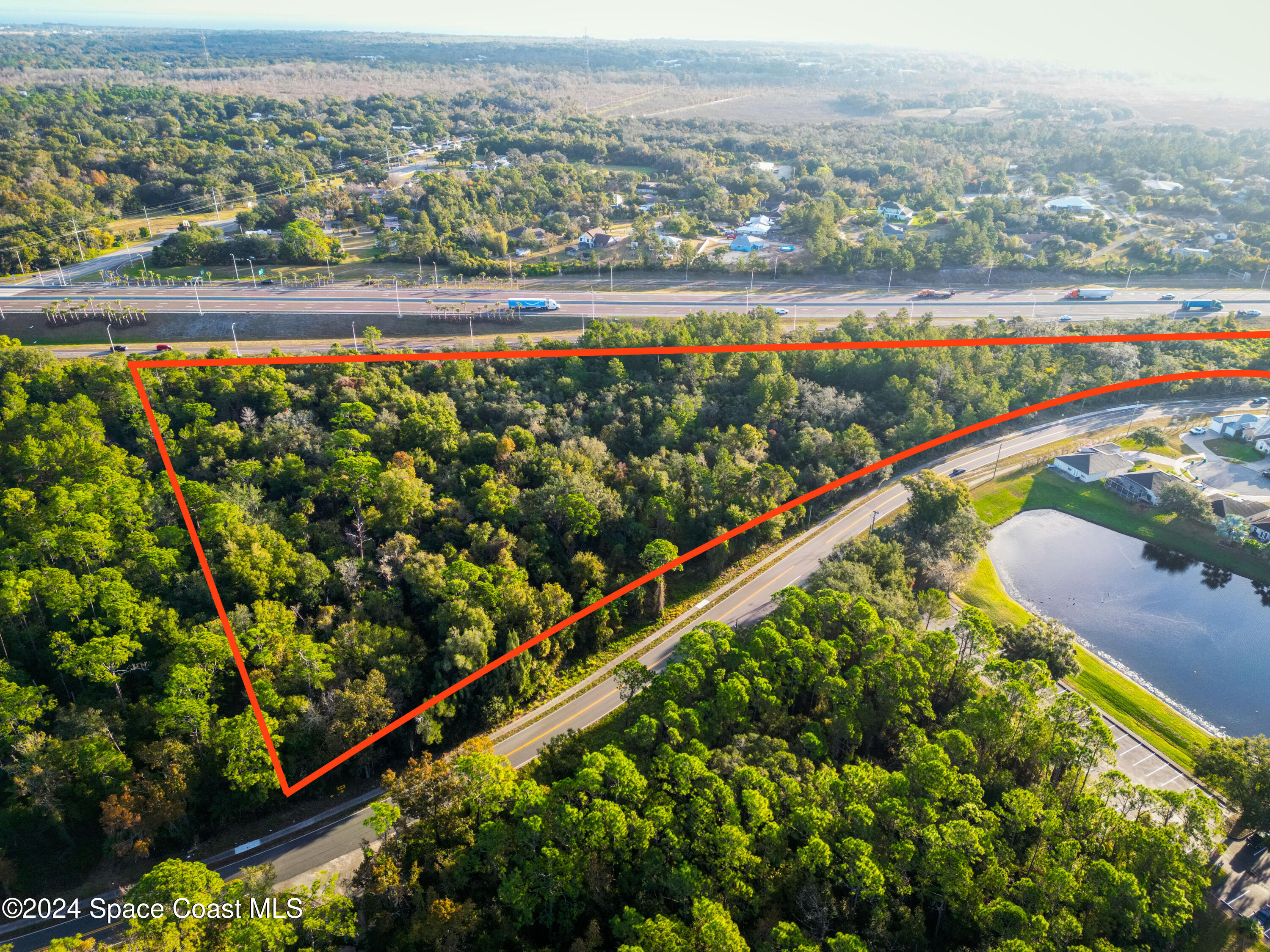 0 North Carpenter Road Titusville, FL 32796 - Photo 7 of 14 an aerial view of a city