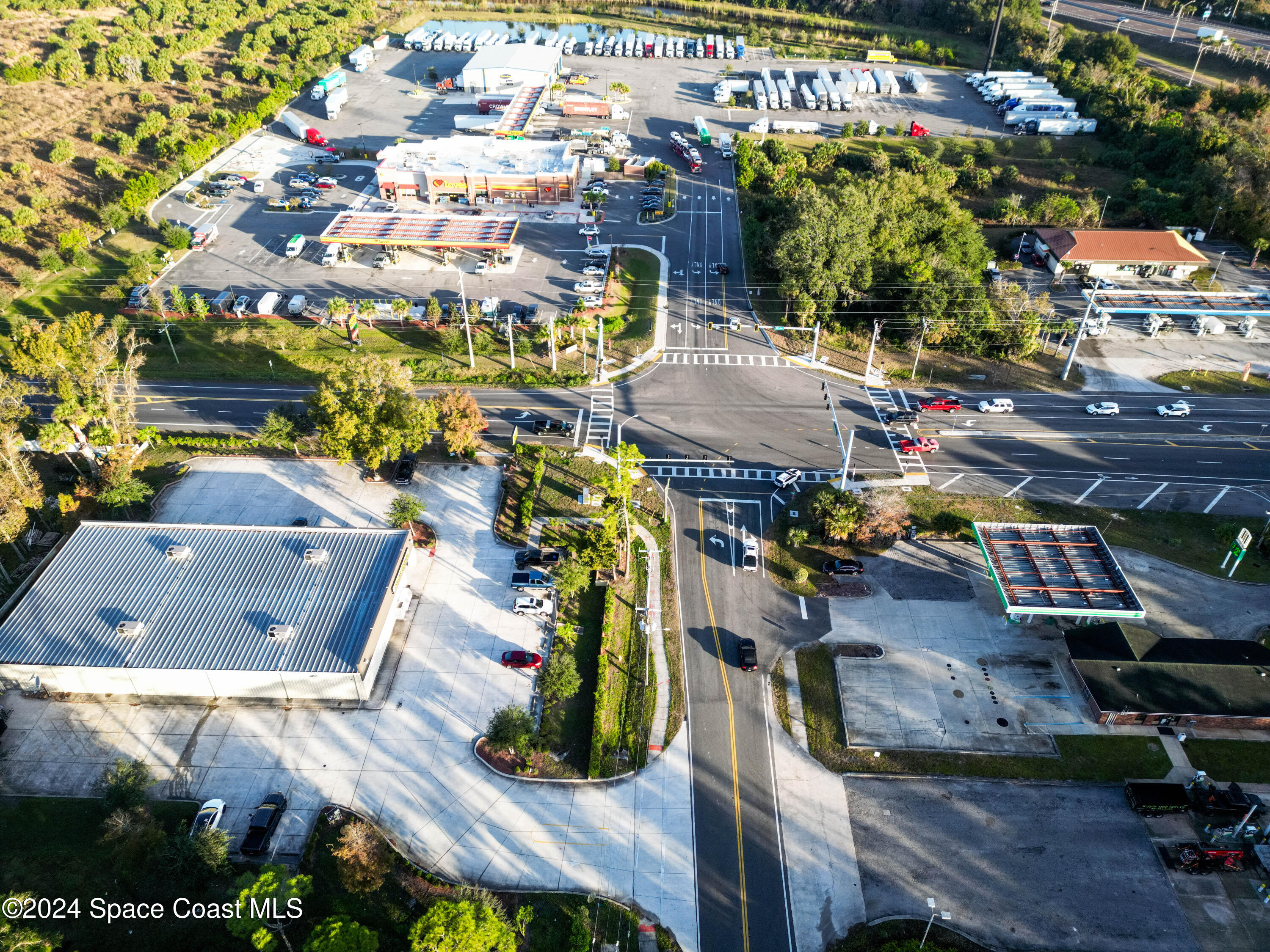 0 North Carpenter Road Titusville, FL 32796 - Photo 8 of 14 a view of multiple houses with yard