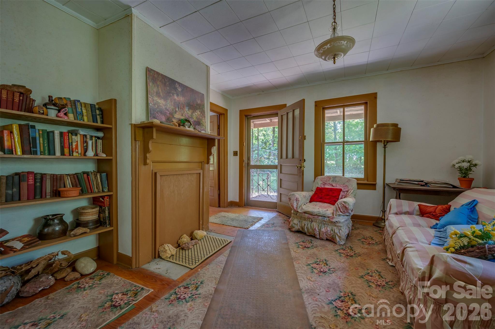 77 1st Street Tryon, NC 28782 - Photo 11 of 20 a living room with furniture cabinets and a window