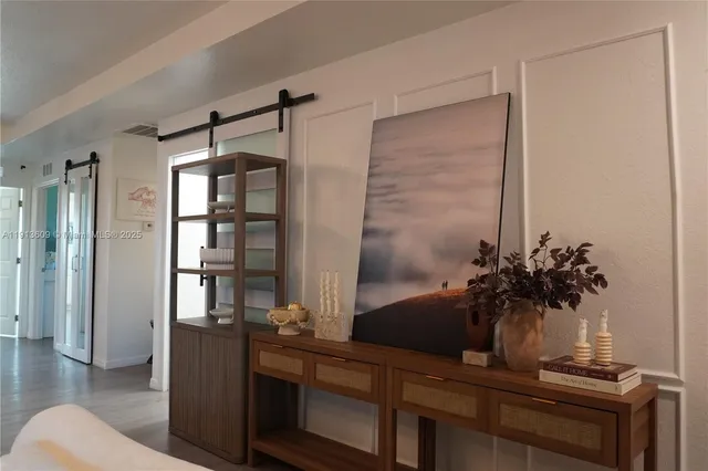 a view of a room with a potted plant