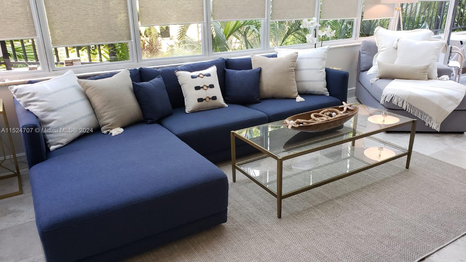 Village of Key Biscayne Key Biscayne, FL 33149 - Photo 13 of 13 a living room with furniture and a window