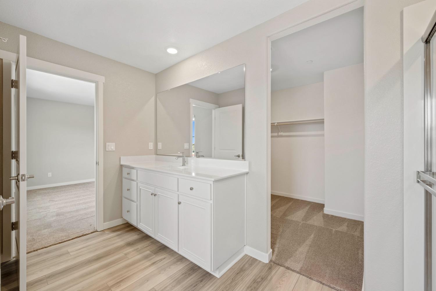 2548 Bog Street Lincoln, CA 95648 - Photo 15 of 21 a bathroom with a sink and a mirror
