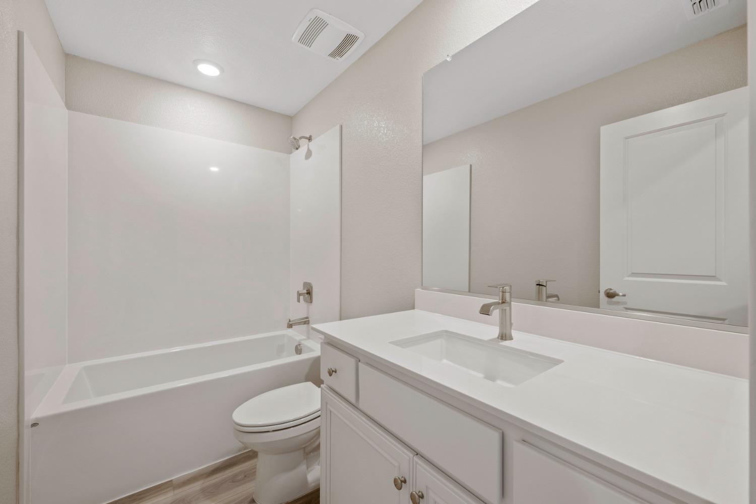 2548 Bog Street Lincoln, CA 95648 - Photo 19 of 21 a bathroom with a sink a toilet and shower