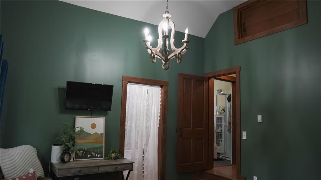 19 Locust Road, Unit 221 Laughlintown, PA 15655 - Photo 27 of 36 Cathedral ceiling and attic access from bedroom