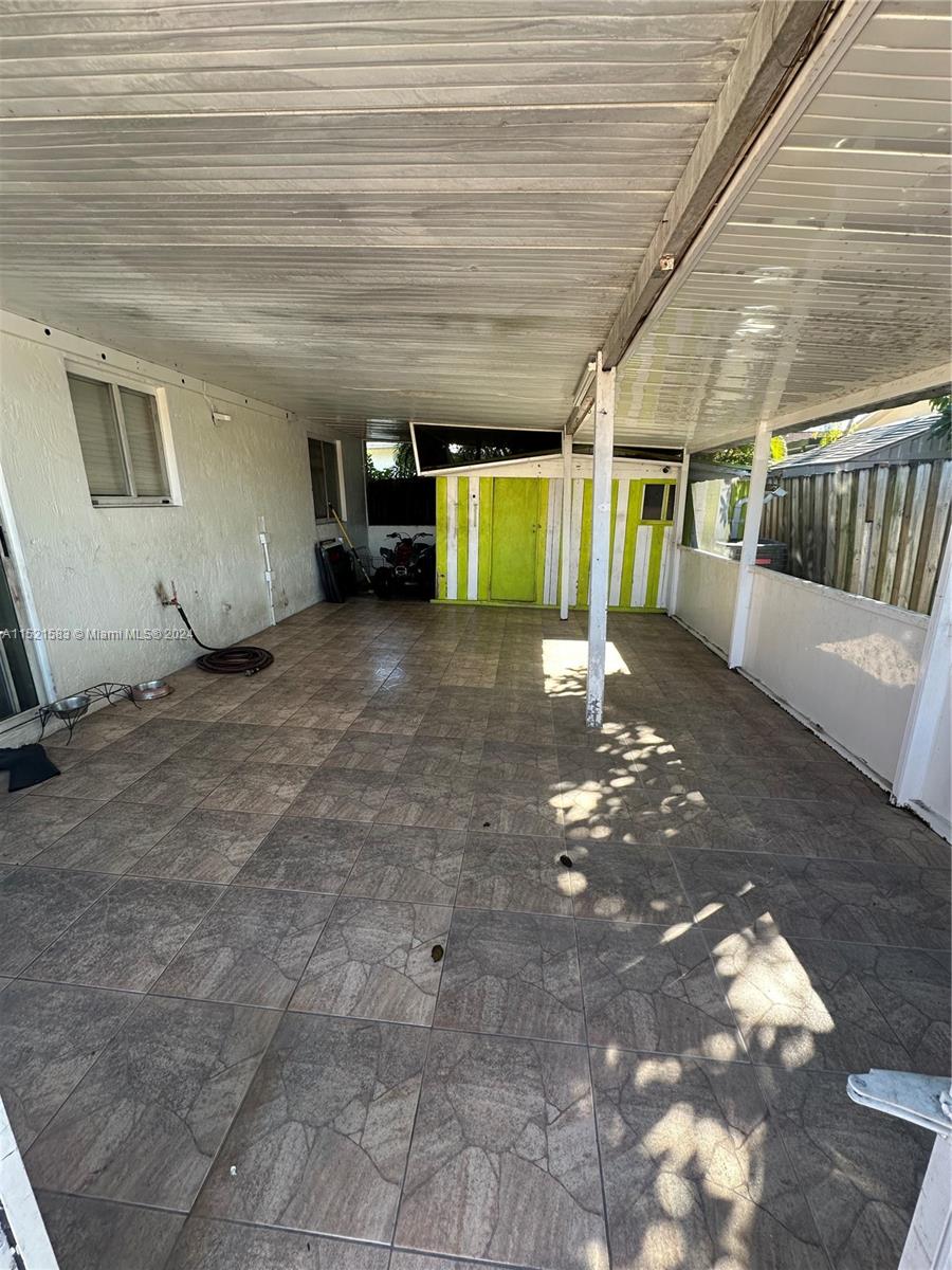 3196 West 79th Place Hialeah, FL 33018 - Photo 14 of 19 a view of empty room with stairs