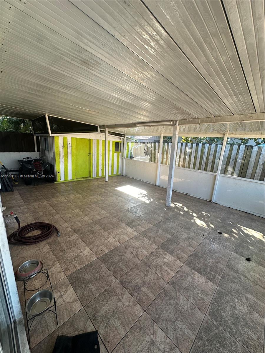 3196 West 79th Place Hialeah, FL 33018 - Photo 16 of 19 a view of an empty room with window